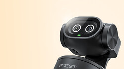EMET robotic camera head with dual wide-angle lenses mounted on support base against cream background.