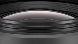 Cross-section view of a camera lens showing internal glass elements and optical construction.