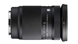 Sigma telephoto zoom lens with ribbed barrel and focus ring against white background.