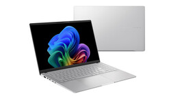 Silver laptop displayed open and closed, showing colorful blue and rainbow wallpaper on screen.