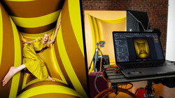 Photographer posing in yellow fabric setup while editor views the same shot on laptop screen nearby.