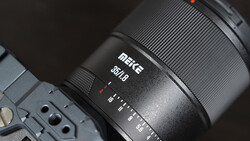 Meike 85mm f/1.8 lens mounted on a camera body, showing the lens barrel and focus ring in detail.