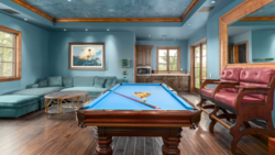 Billiards table with blue felt in a turquoise recreation room with wood ceiling beams.