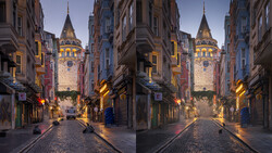 Galata Tower illuminated at dusk in Istanbul, framed by historic buildings along a narrow cobblestone street.