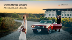 Bride in white wedding dress standing beside a red convertible Mustang with groom in dark suit.