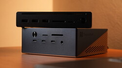 Compact desktop docking station with multiple USB ports and card readers, stacked with a black control panel on top.