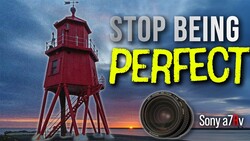 Red lighthouse against dramatic sunset sky with camera lens overlay and motivational text.