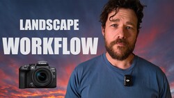 Man in blue shirt standing before dramatic sunset sky with Canon camera and DJI drone displayed.