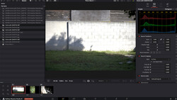 Screenshot of video editing software showing color grading interface with waveform and histogram displays.