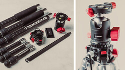 Professional camera tripod with ball head and red accents displayed alongside carbon fiber tripod legs and accessories