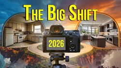 Professional camera on tripod positioned between two kitchen interiors with dramatic sky and landscape background, with '2026' displayed on camera screen.
