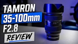 Tamron 35-100mm F2.8 zoom lens with blue accent lighting against dark background.