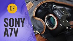 Sony A7V camera body held in brown leather camera strap against purple background with CF logo.