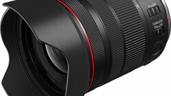 Canon RF-mount telephoto zoom lens with hood and red accent ring