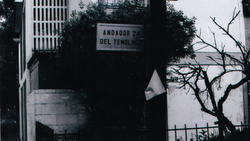 Street sign reading 'ANDADOR 2 DEL TEÚL' mounted on a weathered building corner