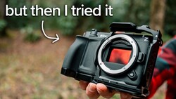 Nikon Z mirrorless camera body held in hand outdoors with meme text overlay