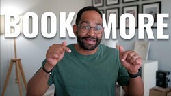 Man in green t-shirt and glasses pointing at camera with 'BOOK MORE' text overlay