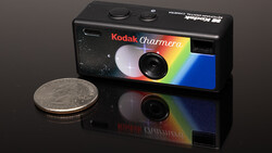 Kodak Charmera compact camera next to a US quarter for scale
