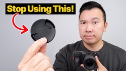 Photographer holding a lens cap with red arrow and yellow text reading 'Stop Using This!'