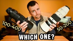 Photographer comparing two telephoto lenses labeled 100-400 and 50-200 against an orange background