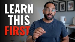 Man in glasses pointing at camera with text overlay 'LEARN THIS FIRST'