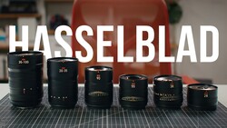 Six Hasselblad prime lenses arranged by focal length, displaying focal lengths from 28mm to 135mm