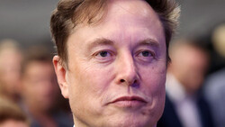 Middle-aged man with serious expression in professional portrait