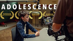 Young actor being interviewed on camera during a film or television production shoot