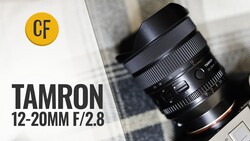 Tamron 12-20mm f/2.8 wide-angle zoom lens with lens hood attached