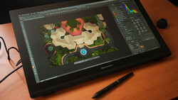 Wacom pen display showing aerial map design with red structures and interface panels