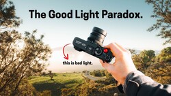 Graphic illustration titled 'The Good Light Paradox' showing a hand holding a cinema camera against a golden-hour landscape, with an arrow labeling the backlit scene as 'bad light'
