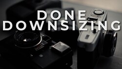 Graphic with text "DONE DOWNSIZING" overlaid on vintage cameras in black and white