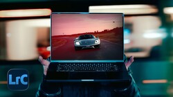 Hands holding laptop displaying sports car at sunset with LrC logo visible
