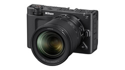 Nikon Z mirrorless camera with attached zoom lens on white background