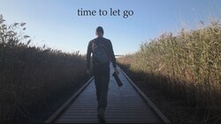 Person jogging away on wooden boardwalk through tall reeds with text overlay 'time to let go'