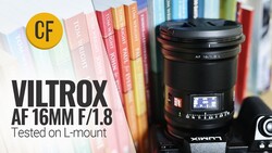 Viltrox AF 16mm f/1.8 lens positioned in front of colorful book spines