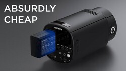 Neewer compact camera with blue battery visible and control panel displayed