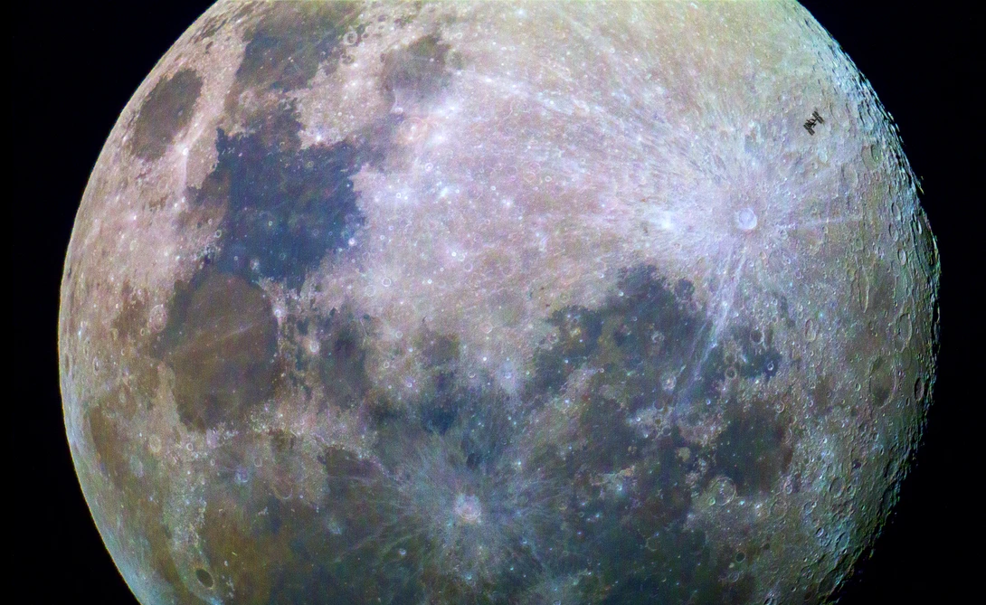 international space station crosses moon
