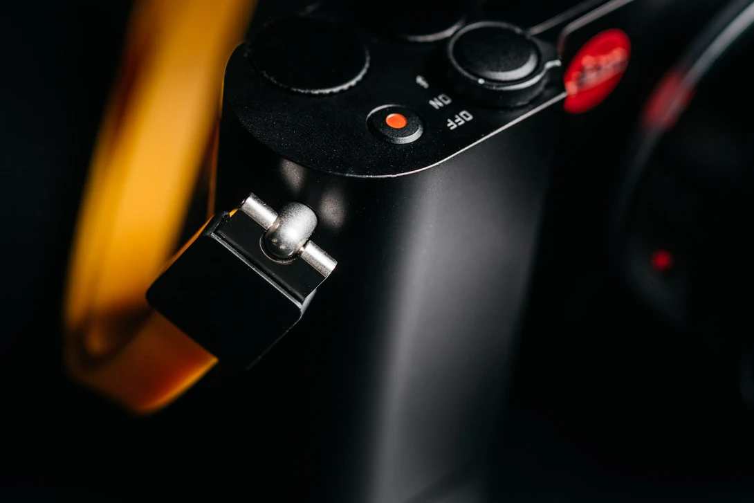 Photo of Leica T's proprietary strap lugs on a wrist strap