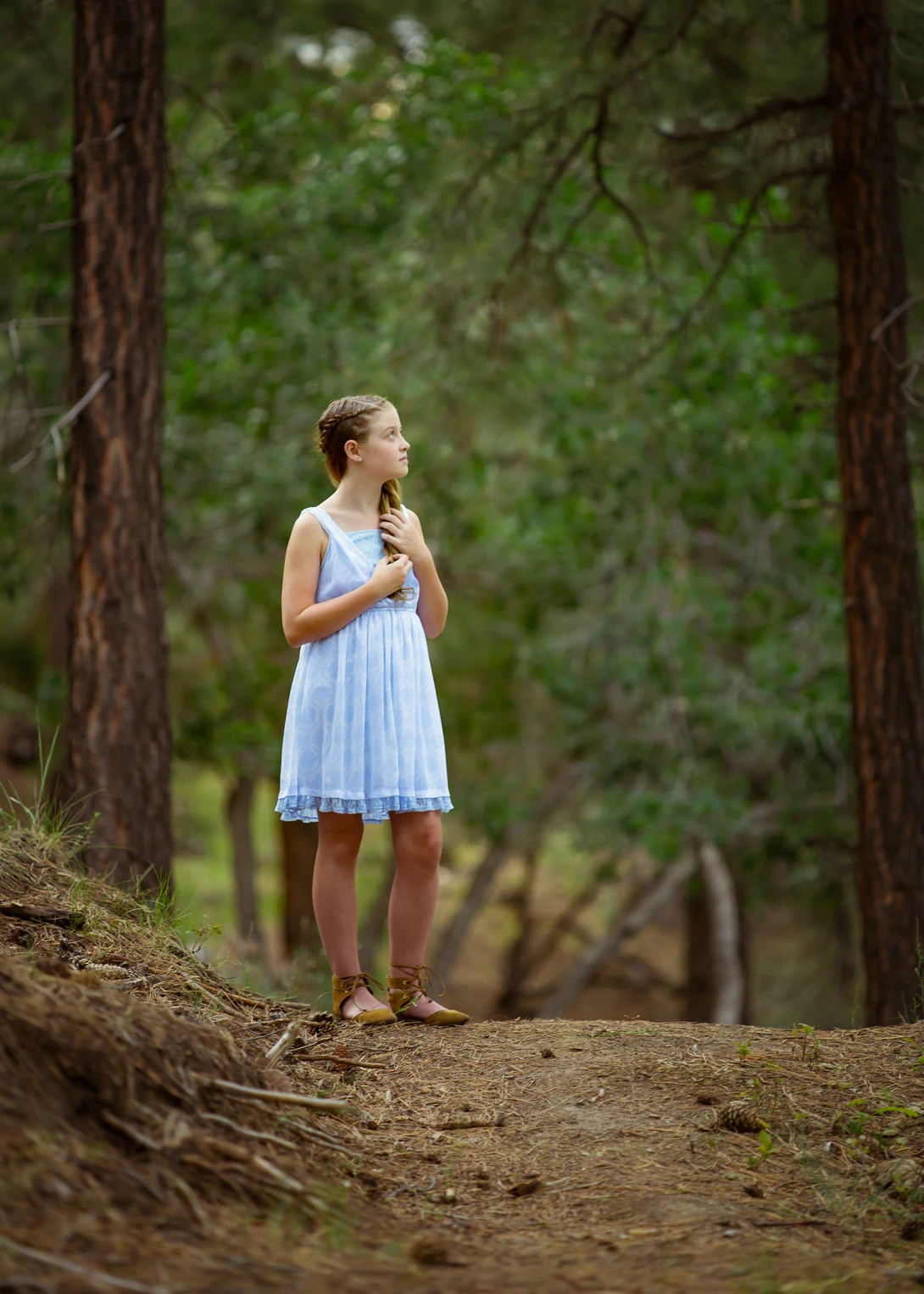portrait of a young girl taken from standing up