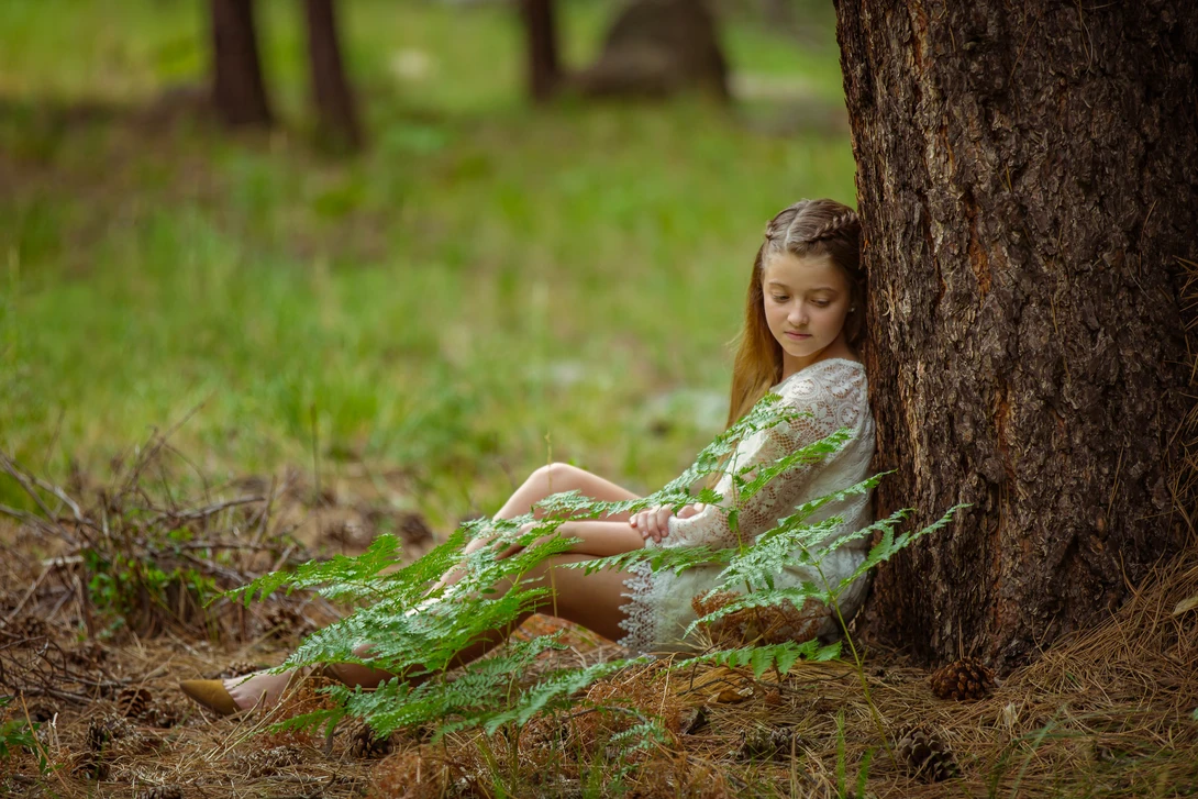 portrait of a young girl taken from a standing upright position