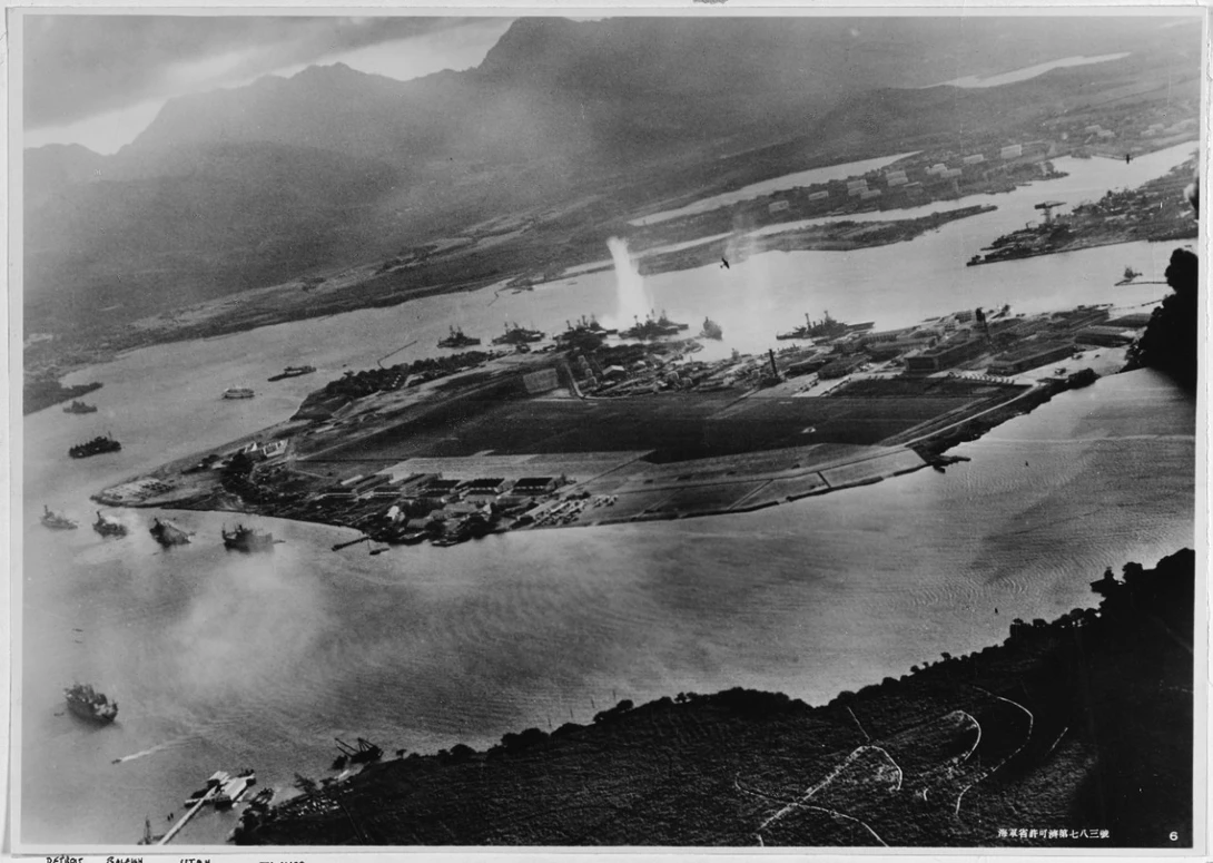 Image taken from a Japanese plane during the torpedo attack on ships moored on both sides of Ford Island.