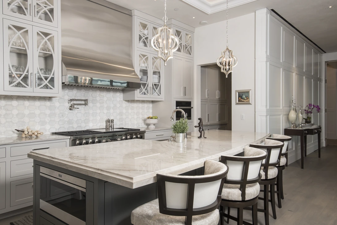 An interior architectural image of a luxury kitchen showing shadows caused by flash