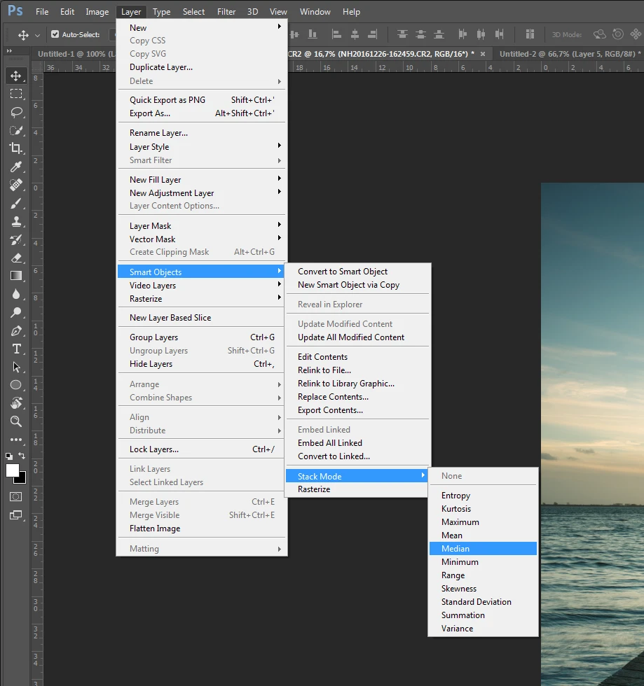 After the Smart Object is made, you can stack the layers in the Smart Object. The best result will be Median stack, but you can experiment with other stacking modes.