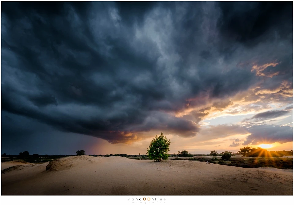 These are the moments I prefer. Thick rain clouds and clear skies during sunset. You have to be at the location before this happens, even when it means to go out when it is still raining. (Fujifilm X-Pro2 + 10mm | ISO200 | f/16 | 1/10)
