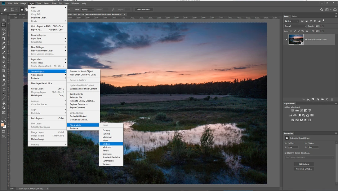 By using the stack mode [median] all layers that are present in the smart object will be merged and the noise will disappear. The method is more effective when using more images.