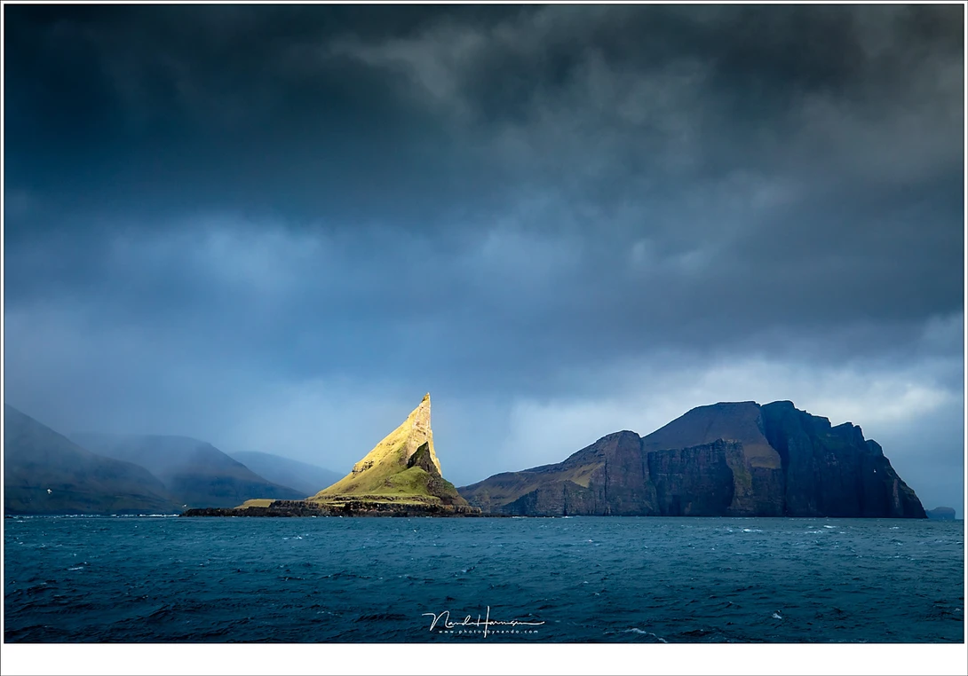 You cannot predict everything, but you have to be ready. When I visited the Faroe Islands this year, the sunlight illuminated the famous mountain of Tintholmur for a few seconds. I was ready to capture this moment, that lasted for a few seconds. (EOS 5D4 