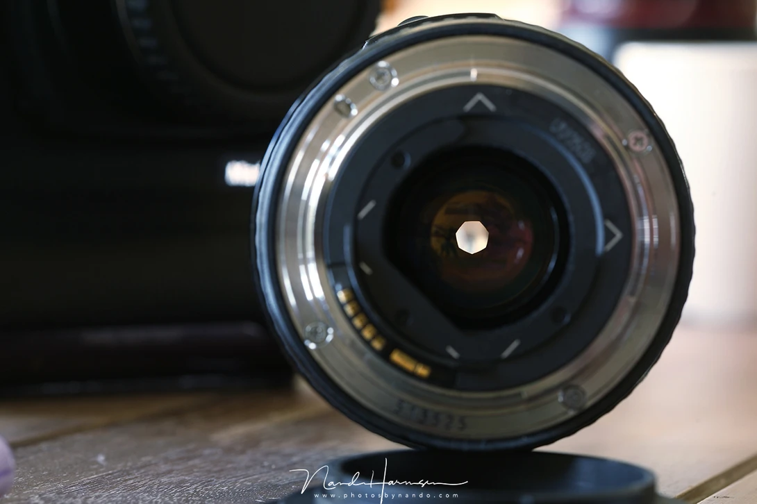 When using the DOF button when removing the lens from the camera, the aperture that was chosen is kept inside the lens.