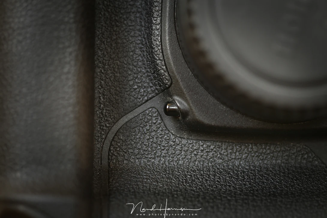 The depth of field button on a Canon EOS 1D mark III