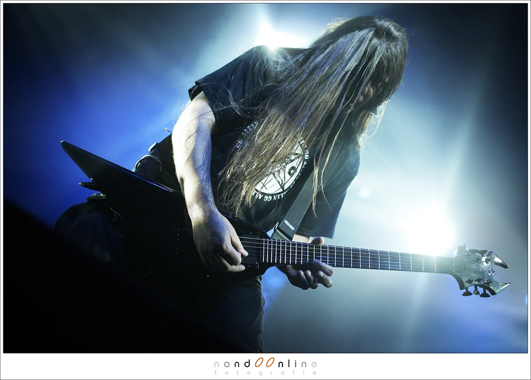 Slayer in concert, back in 2012. The bright lights in the back would have caused a silhouet if I wouldn't have used exposure compensation. A spot meter didn't work for me. 